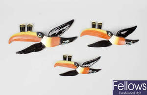 A set of three graduated advertising Carltonware Guinness pottery wall plaques, modelled as toucans.