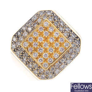 A diamond cluster signet ring.
