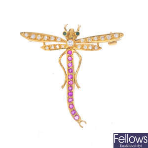 An 18ct gold diamond, ruby and emerald dragonfly brooch.