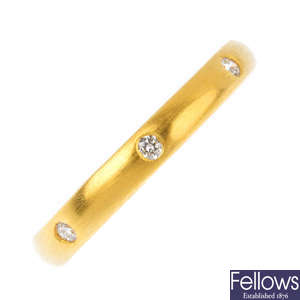 A 24ct gold diamond ‘I love you 24/7’ band ring.