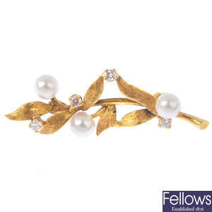 An 18ct gold, diamond and cultured pearl brooch.