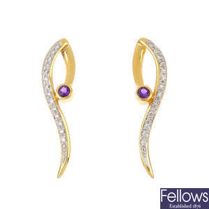 A pair of 18ct gold amethyst and diamond earrings.