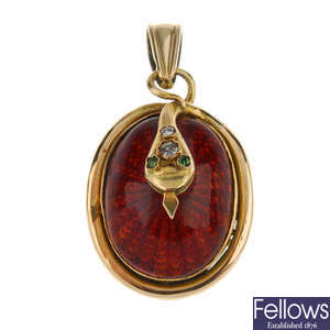 A late Victorian 9ct gold enamel and diamond snake memorial pendant.