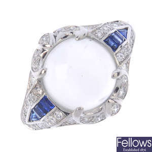 A moonstone, sapphire and diamond dress ring.