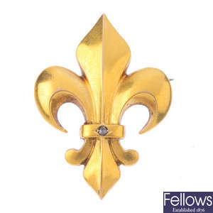 A late Victorian gold fleur-de-lis diamond brooch, circa 1870.