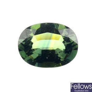 An oval-shape green sapphire, weighing 5.32cts.