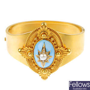 A late 19th century gold split pearl, diamond and enamel hinged bangle.