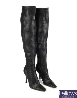 GUCCI by Tom Ford - a pair of over-the-knee black python skin boots.