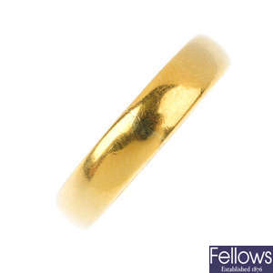 A mid 20th century 22ct gold band ring.