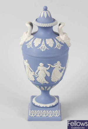 A Wedgwood Prestige blue jasperware 'Dancing Hours' urn and cover.