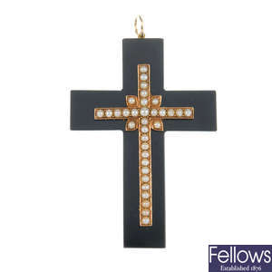 A late Victorian onyx and seed pearl cross pendant.