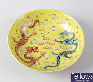 A Chinese porcelain yellow ground bowl