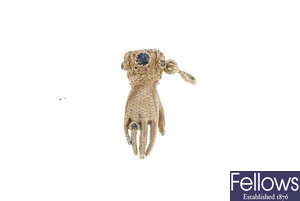 A 9ct gold figa gem set pendant.