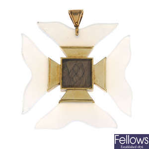 A late 19th century chalcedony memorial Maltese gold cross pendant.