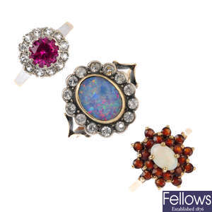 Three gem-set dress rings.