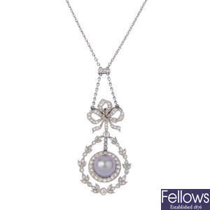 An Edwardian platinum, cultured pearl and diamond pendant, with fitted Koch case.