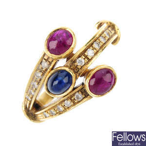 A sapphire, ruby and diamond dress ring.