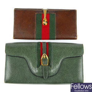 GUCCI - two mid 20th century vintage leather wallets.
