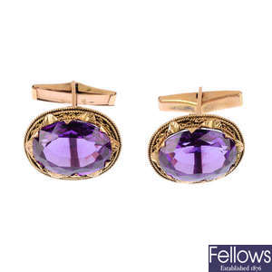 A pair of synthetic sapphire cufflinks.