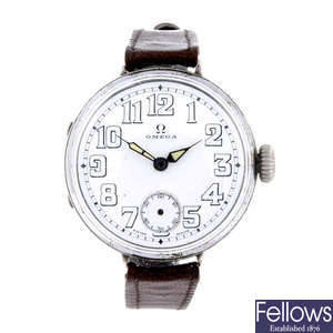 OMEGA - a gentleman's silver trench style wrist watch.