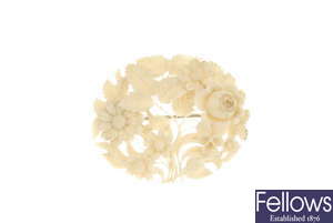 A late 19th century carved ivory brooch. 