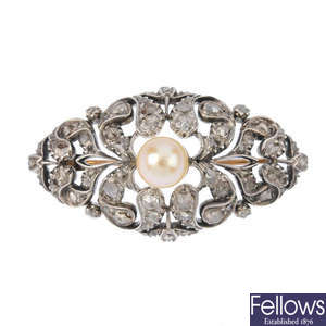 A late 19th century silver and gold cultured pearl and diamond brooch.
