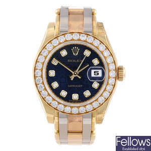 CURRENT MODEL: ROLEX - a lady's 18ct yellow gold Oyster Perpetual Pearlmaster bracelet watch.