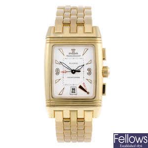 JAEGER-LECOULTRE - a gentleman's 18ct yellow gold Reverso Gransport Chronographe chronograph bracelet watch.