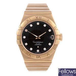 OMEGA - a gentleman's 18ct rose gold Constellation Co-Axial bracelet watch.