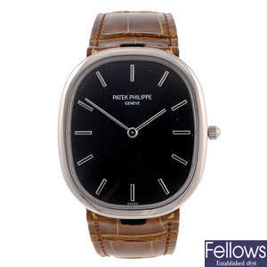 CURRENT MODEL: PATEK PHILIPPE - a gentleman's 18ct white gold Golden Ellipse wrist watch.