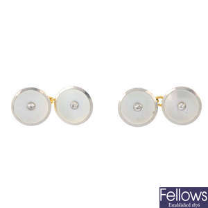 A pair of mid 20th century 18ct gold mother-of-pearl and diamond cufflinks.