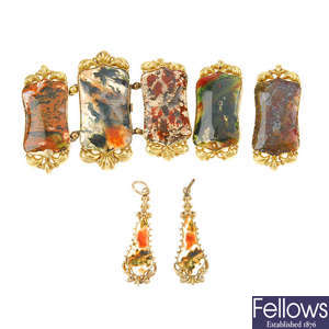 Five decorative agate panels and two agate pendant drops. Two panels with clasp. 