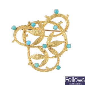 A 1960s 9ct gold reconstituted turquoise brooch.