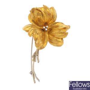 A 1960s 18ct gold diamond floral brooch.