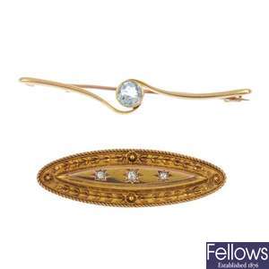 A late Victorian 15ct gold diamond brooch and a later 15ct gold aquamarine brooch.
