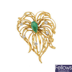 An emerald and diamond abstract brooch.