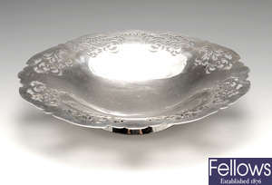 A modern pierced silver footed dish & a similar plated example. (2).