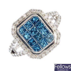 An 18ct gold colour treated 'blue' diamond and diamond dress ring.