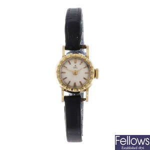 EBEL - a lady's yellow metal wrist watch.