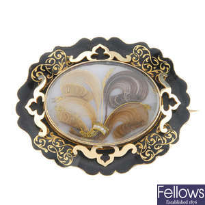 A late Victorian gold enamel memorial brooch.