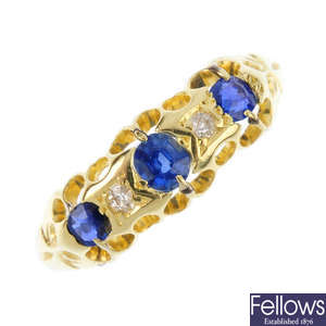 An early 20th century 18ct gold sapphire, diamond and garnet-topped-doublet five-stone ring.