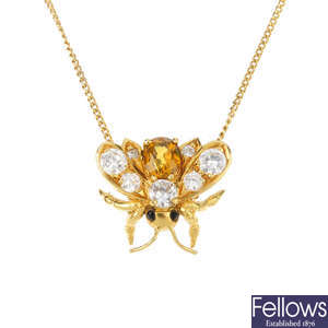 A chrysoberyl and diamond insect necklace.