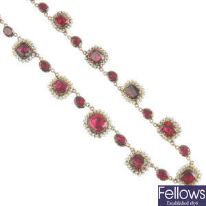 An early Victorian foil-back garnet and seed pearl necklace, with similar brooch. 