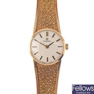 OMEGA - a 1970s 9ct gold manual-wind wristwatch.