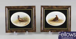 A pair of framed Wedgwood painted oval plaques, pheasant & partridge.