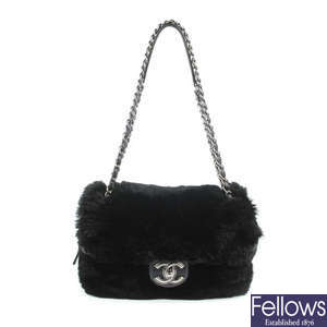 CHANEL - a Fur Flap handbag.