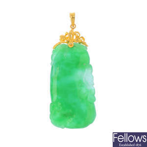 A carved jade pendant.