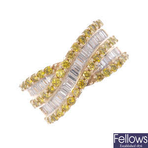 A colour treated 'yellow' diamond and diamond dress ring.
