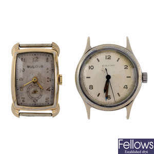 BULOVA - a gold plated watch head together with a Baume watch head.