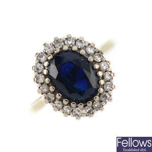 An 18ct gold sapphire and diamond cluster ring.